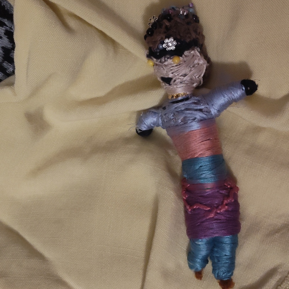 Handmade string doll